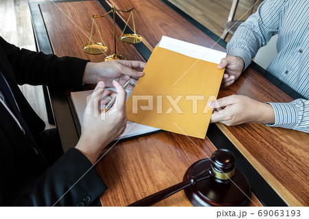 Professional male lawyer or counselor discussing 69063193