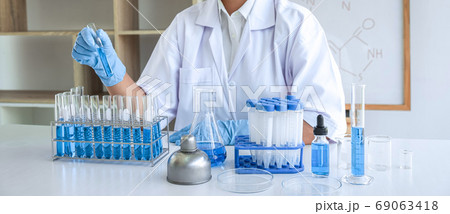 Female scientific researcher or doctor working in Female scientific researcher or doctor working in 69063418