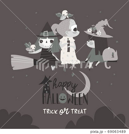 Cute Halloween witches flying on broom in the night sky 69063489