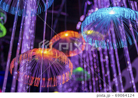 Red blue neon garlands of bokeh lights and reflections. 69064124