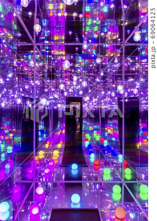 Red blue neon garlands of bokeh lights and reflections. 69064125