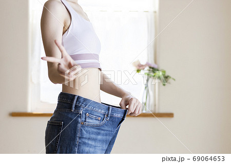 ダイエットに成功した女性の写真素材