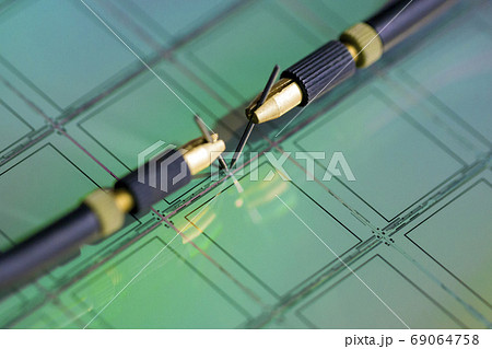 Manual probe system with needles for test of semiconductor on silicon wafer. Selective focus. 69064758