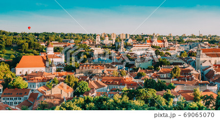 Vilnius, Lithuania. Summer Sunset Sunrise Over Cityscape Of Vilnius, Lithuania. Beautiful View Of Old Town at Evening Vilnius, Lithuania. Summer Sunset Sunrise Over Cityscape Of Vilnius, Lithuania. Beautiful View Of Old Town at Evening 69065070
