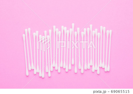 Top view cotton bud for cleaning the ears on pink Top view cotton bud for cleaning the ears on pink 69065515