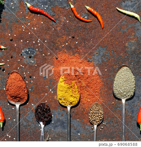 silver spoon with various spices silver spoon with various spices 69068588