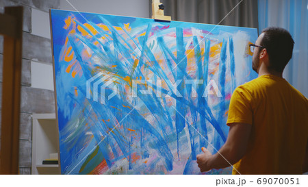 Hand painting in art studio 69070051