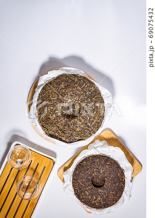 Chinese Tea Shu Shen Puer. Close-up. Pressed Tea. top view flat lay Chinese Tea Shu Shen Puer. Close-up. Pressed Tea. top view flat lay 69075432