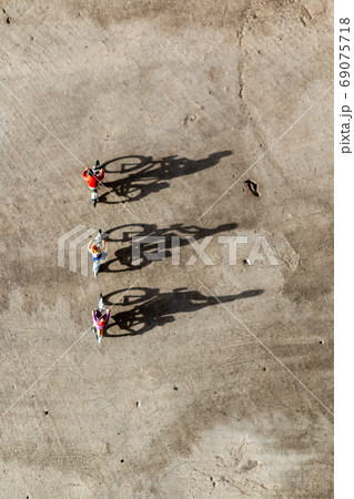 Miniature people : Travelers riding bicycle , Healthy lifestyle concept Miniature people : Travelers riding bicycle , Healthy lifestyle concept 69075718