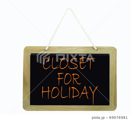 white background blackboard with closed for holidays 69076981