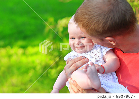 Dad and daughter in the park. Portrait of dad and child. 69079677