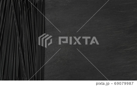 Raw Black Spaghetti, Dry Pasta with Cuttlefish Ink 69079987