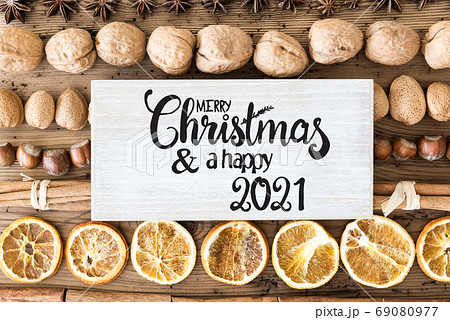 Christmas Food Flat Lay, Label With Merry Christmas And Happy 2021 Christmas Food Flat Lay, Label With Merry Christmas And Happy 2021 69080977