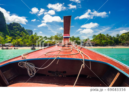 Traveling by long tail boat to Railay Beach, Krabi. Vacation in Thailand Traveling by long tail boat to Railay Beach, Krabi. Vacation in Thailand 69083356