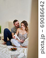 Married couple spending time together and talking. 69086642