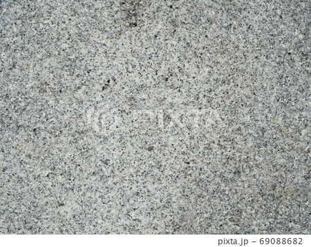 The texture of a granite stone. Top-down close-up The texture of a granite stone. Top-down close-up 69088682