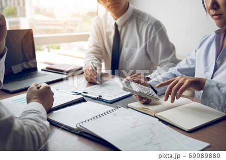 Group of businessmen discussion analysis sharing calculations ab Group of businessmen discussion analysis sharing calculations ab 69089880