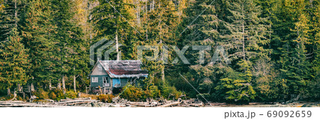 Abandoned house in the forest wilderness - Alaska landscape background panorama banner. 69092659