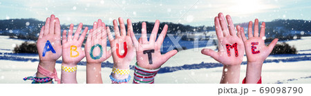 Children Hands Building Word About Me, Snowy Winter Background 69098790