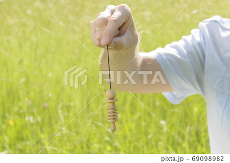 Using big wooden pendulum 69098982