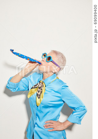Senior woman having fun Senior woman having fun 69099400