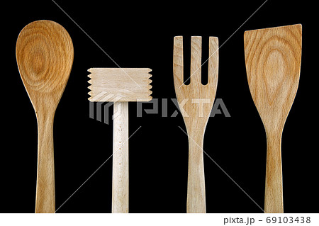 Wooden Kitchen Utensils Isolated on Black Wooden Kitchen Utensils Isolated on Black 69103438