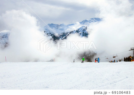 Saalbach, Austria ski slope and snow peaks panorama 69106483