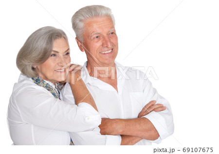Close up portrait of happy senior couple on white background 69107675