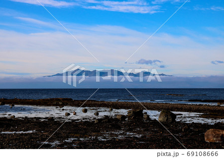 Isle of Arran in Cloud From Seamill Beach Scotland Isle of Arran in Cloud From Seamill Beach Scotland 69108666