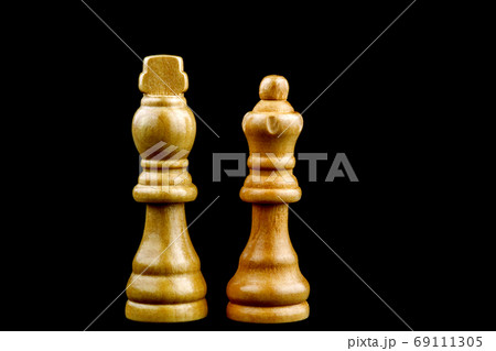 King and Queen Chess Pieces Isolated on a Black Background 69111305