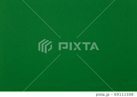 Green Coloured Parchment Sheet Close Up for Background Green Coloured Parchment Sheet Close Up for Background 69111306