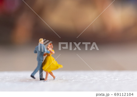 Couple dancing on the floor , Valentine's day concept Couple dancing on the floor , Valentine's day concept 69112104