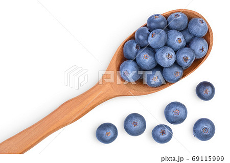 fresh ripe blueberry in wooden spoon isolated on white background with clipping path . Top view with copy space for your text. Flat lay 69115999
