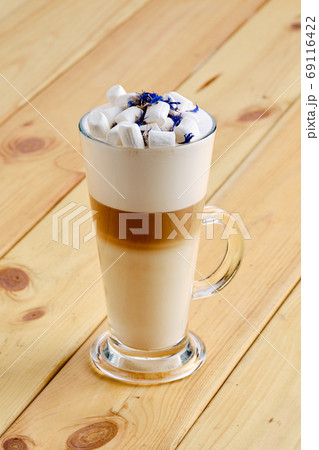 Latte macchiato in tall transparent glass 69116422