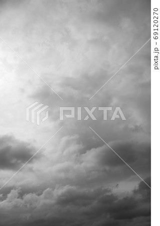 Cloudscape, overcast grey clouds over horizon. Cloudy gray sky background. Cloudscape, overcast grey clouds over horizon. Cloudy gray sky background. 69120270