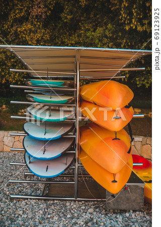 surf boards and kayaks at beach surf boards and kayaks at beach 69123925