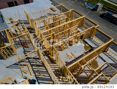 Wooden house frame structure on a new development 69124193