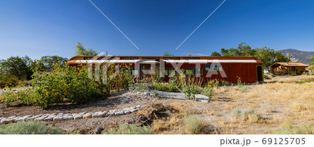 Sunny view of a beautiful house Sunny view of a beautiful house 69125705