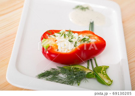 Photography of plate with pepper stuffed with brynza 69130205