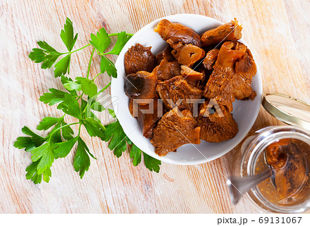 Salad of pickled red pine mushrooms with greens 69131067