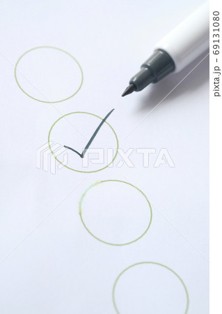 Check list with black pen on paper. Check list with black pen on paper. 69131080