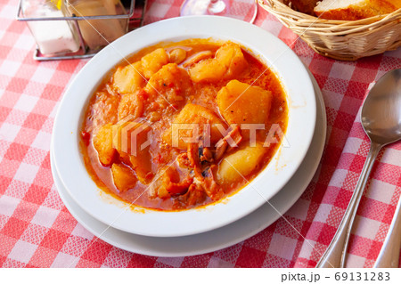 Braised squid with potatoes Braised squid with potatoes 69131283