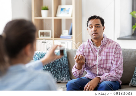man and psychologist at psychotherapy session man and psychologist at psychotherapy session 69133033