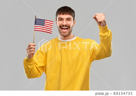 happy laughing man with flag of america happy laughing man with flag of america 69134735