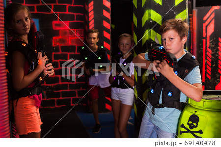 Boy during lasertag game 69140478