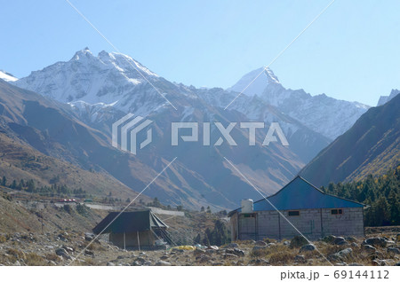 A mountain Alpine hut cabin in high Himalayas mountain 69144112