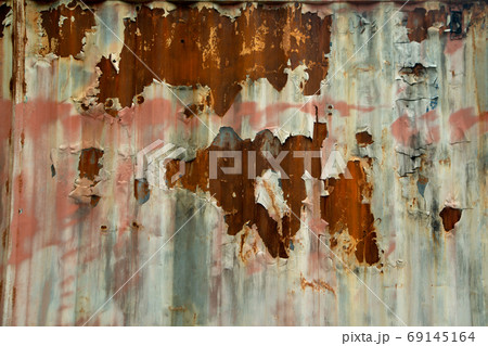 Wall of old rusted zinc surface texture , Zinc with rust pattern background Close up to pattern texture vertical zinc. Wall of old rusted zinc surface texture , Zinc with rust pattern background Close up to pattern texture vertical zinc. 69145164