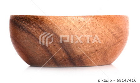 Wooden bowl on white background Wooden bowl on white background 69147416