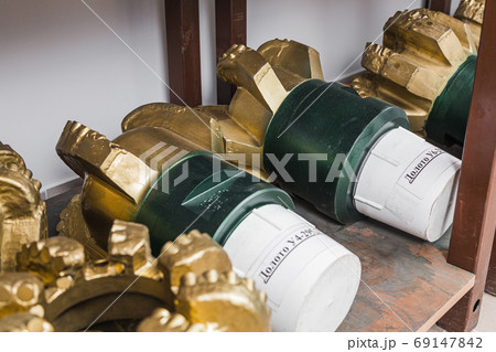 Oil drilling equipment for drilling rig operation on oil platform in oil and gas industry. Brand new PDC Polycrystalline Diamond Compact drilling head for core drilling. Written: drilling bit Oil drilling equipment for drilling rig operation on oil platform in oil and gas industry. Brand new PDC Polycrystalline Diamond Compact drilling head for core drilling. Written: drilling bit 69147842