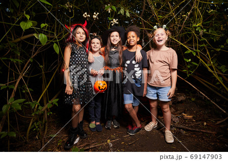 Happy kids at Halloween party 69147903